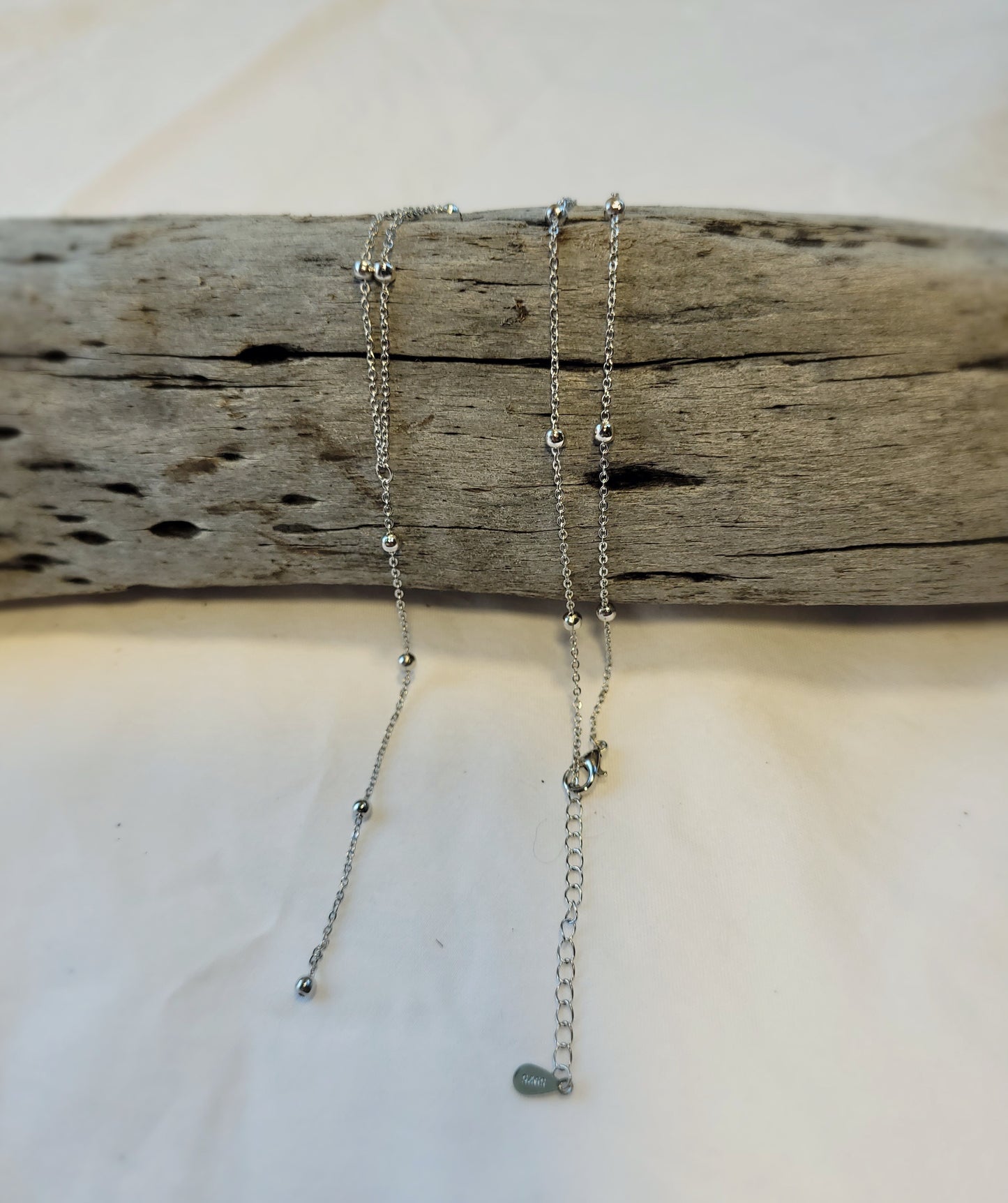 Silver Round Bead Tassel Necklace