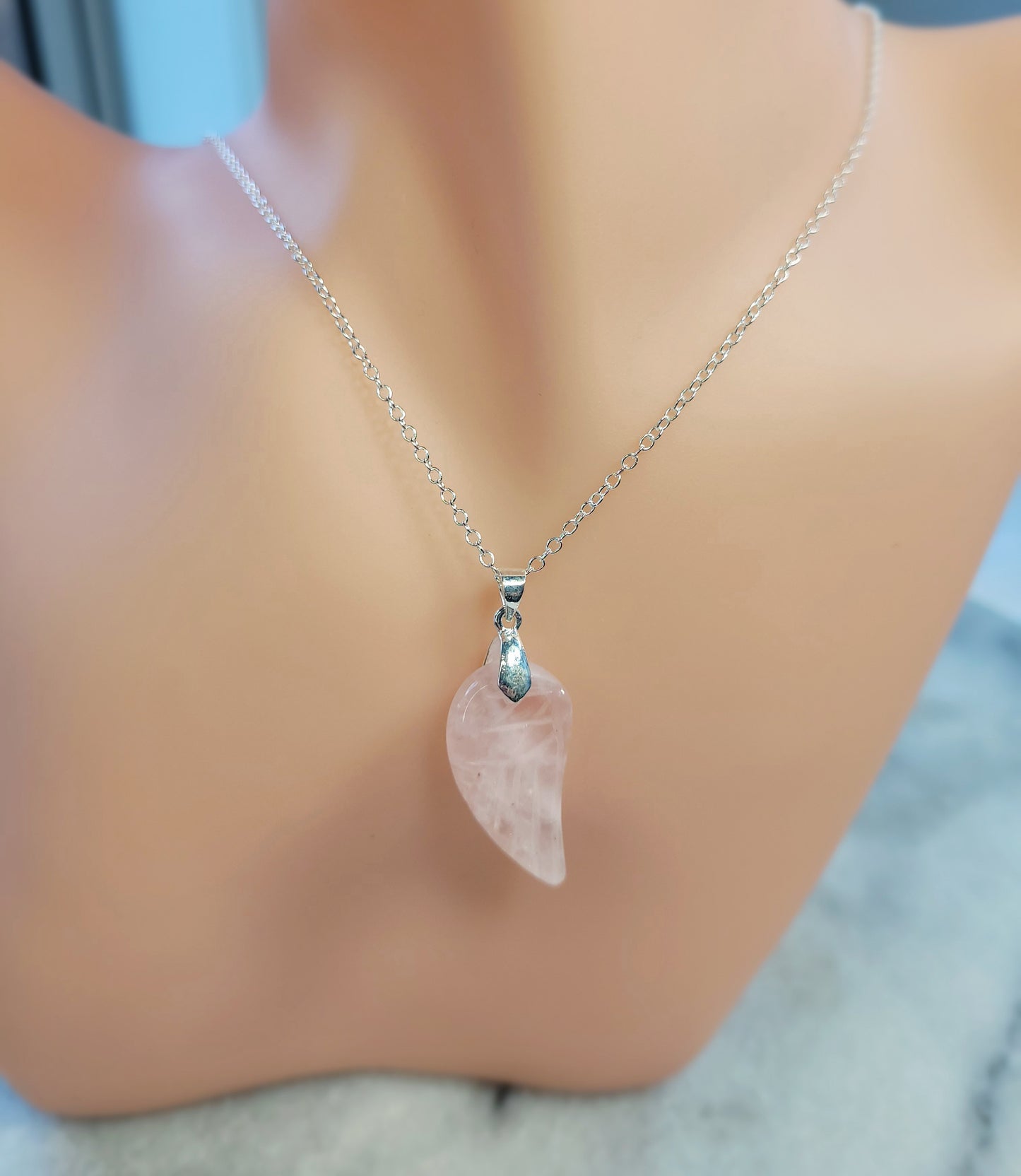 Rose quartz angel wing crystal with silver necklace