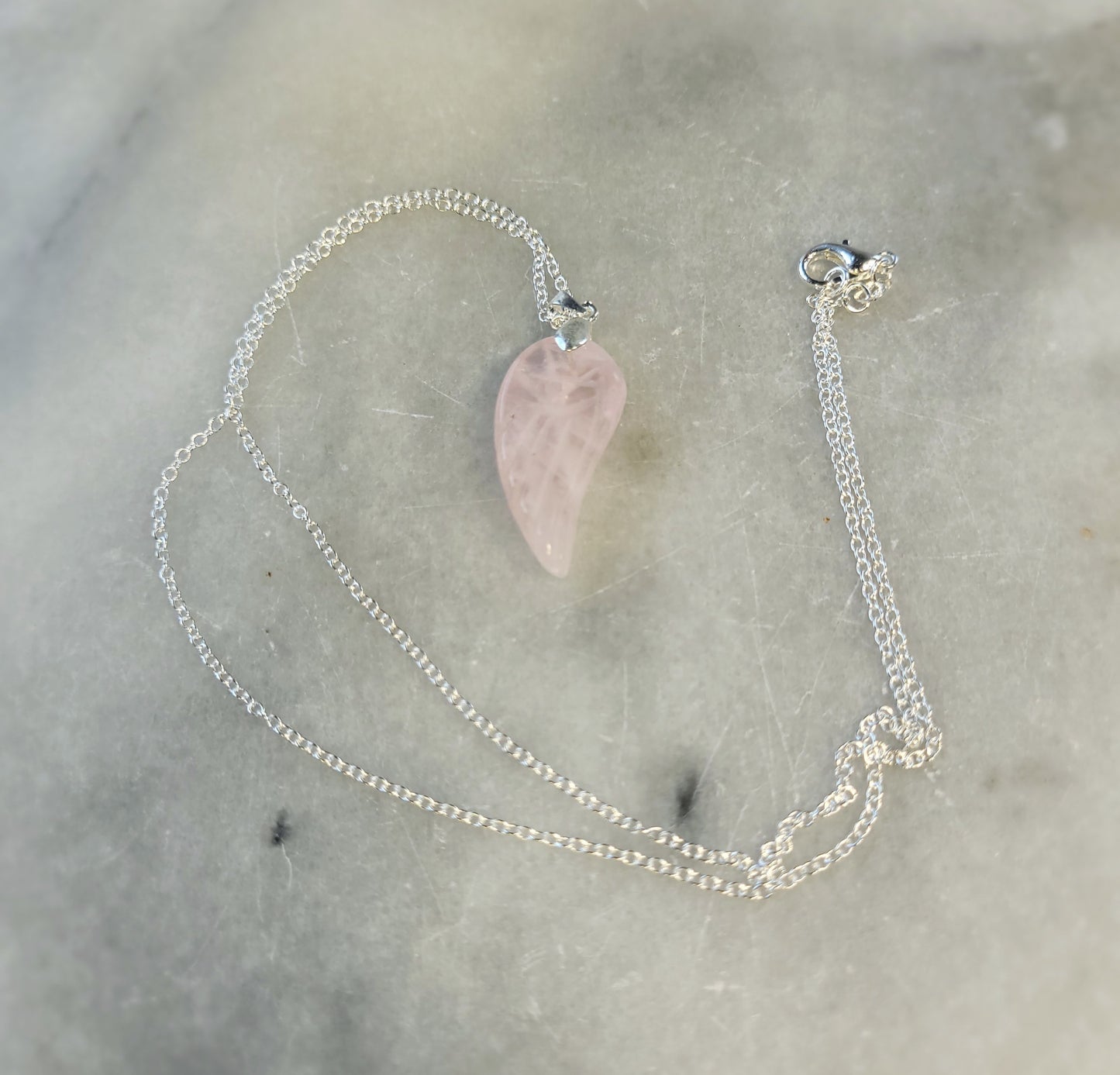 Rose quartz angel wing crystal with silver necklace